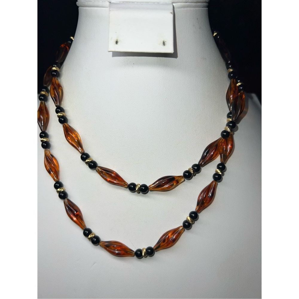 Vintage Monet Faux Amber and Black Plastic Bead Barrel Closure Necklace 36”